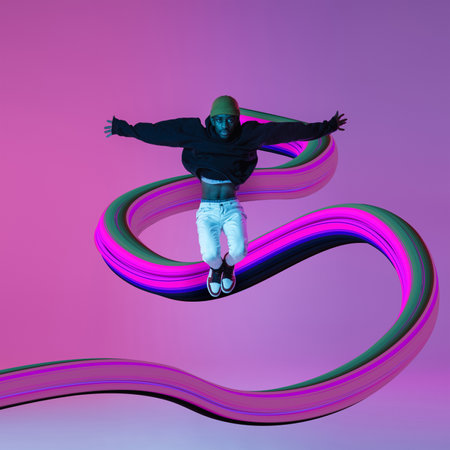 Stylish man with long fluid flood on gradient background. Negative space to insert your text. Modern design. Contemporary colorful and conceptual bright art collage.の写真素材