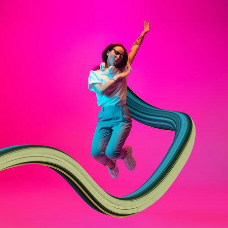 Stylish woman with long fluid flood on gradient background. Negative space to insert your text. Modern design. Contemporary colorful and conceptual bright art collage.の写真素材