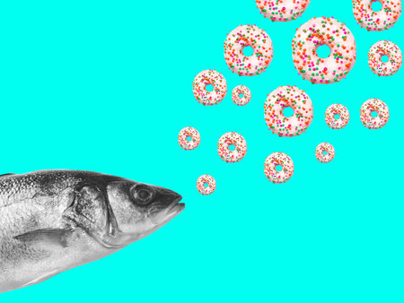 Contemporary art collage, modern design. Summer mood. Fresh fish and donuts on neon blue background