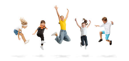 Art collage made of portraits of little and happy kids isolated on white studio background. Human emotions, facial expression conceptの写真素材