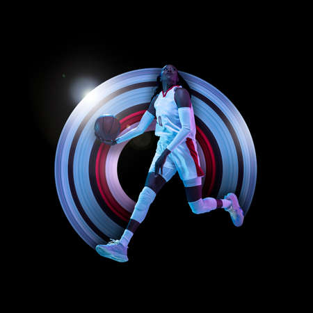 Abstract desing, concept of sport, action, motion in sport. Young african female basketball player...