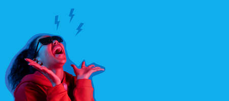 Contemporary art collage, modern design. Retro style. Woman on blue studio background in magazine...