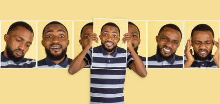 Smiling young Africa man holding portraits with different emotions, facial expression isolated on yellow background.の写真素材