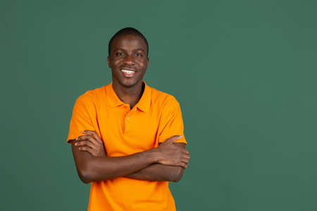 African young male portrait isolated over studio background with copyspaceの写真素材