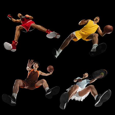 Young professional basketball player in action, motion isolated on black background, look from the bottom. Concept of sport, movement, energy and dynamic.の写真素材