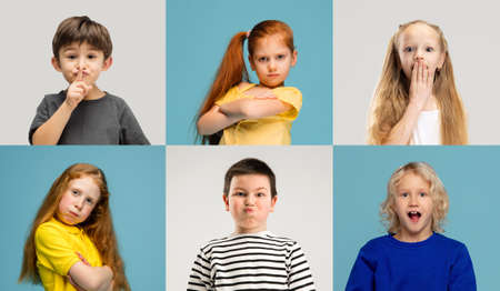 Art collage made of portraits of little and happy kids isolated on multicolored studio background. Human emotions, facial expression conceptの写真素材