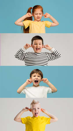 Art collage made of portraits of little kids isolated on multicolored studio background. Human emotions, facial expression conceptの写真素材