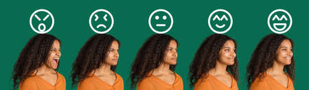 Evolution of emotions. African womans portrait isolated over green studio background with copyspace for ad. Drawings.の写真素材