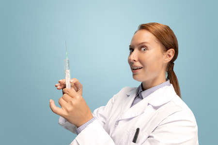 Portrait of doctor, therapeutic or medical advisor at work. Funny meme emotions. Concept of healthcare, care medicine and humorの写真素材