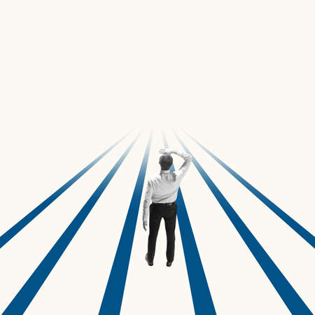 Successful businessman standing on blue lines, way or path to success and goal. Right direction