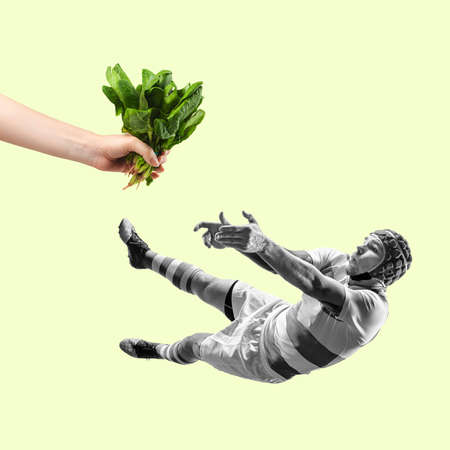 Artwork. Composition with rugby player falling and catching letuce, microgreen. Healthy lifestily, food, wellbeing concept.の写真素材
