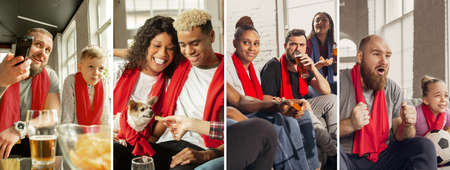 Excited, happy people watching football, soccer match on the couch at home. Fans emotional cheering for favourite national team. Having fun together, supporting.の写真素材