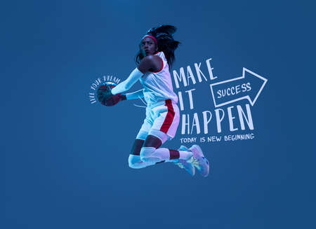 Artwork. Sportive african-american woman, female basketball player in motion and action in neon...
