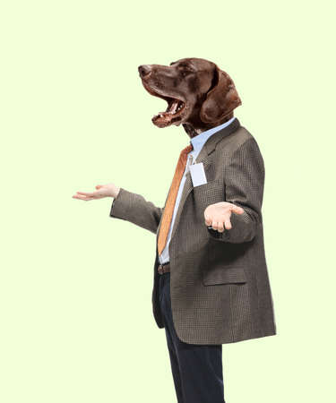 Contemporary artwork, conceptual collage. Man wearing business suit headed by dog head. Trendy colors.の写真素材