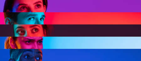 Collage of close-up male and female eyes isolated on colored neon backgorund. Multicolored stripes.の写真素材