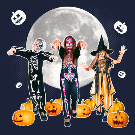 Artwork. Cute kids or teens wearing costumes of witches and vampires with bones and glitter isolated on abstract background.の写真素材