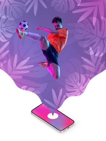 Contemporary art collage. Inspiration, idea, magazine style. Sport. Professional male soccer, football player on bright neon abstract backgroundの写真素材