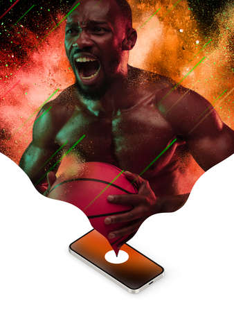 Contemporary art collage. Inspiration, idea, magazine style. Sport. Professional male basketball player on bright neon abstract backgroundの写真素材