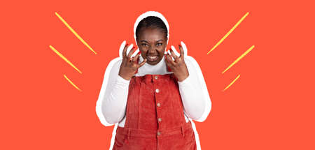 Contemporary art collage, modern design. Magazine, zine style. Angry, displeased woman on red studio backgroundの写真素材