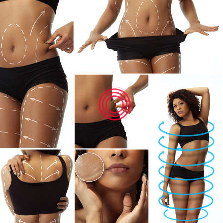 Preset. Perfect slim tanned young fit woman posing isolated over white studio background. The...