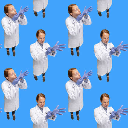 Top view. Conceptual seamless pattern with female doctor standing isolated on blue background. Concept of healthcare, medicineの写真素材