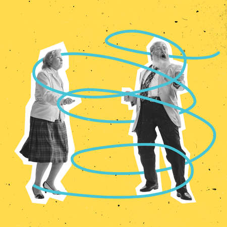 Emotional couple of dancers dressed in 70s, 80s fashion style dancing rock-and-roll on blue background with drawings.の写真素材
