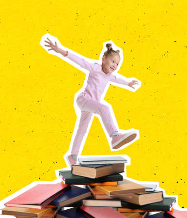 Contemporary art collage of little girl walking over stack of books isolated over yellow backgroundの写真素材