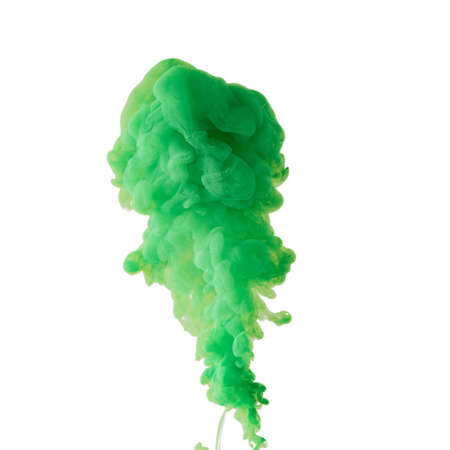 Light green. Explosion of colored, fluid and neoned liquids on white studio background with copyspaceの写真素材