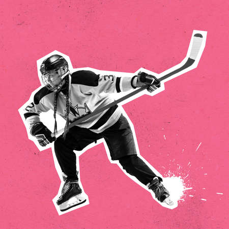Creative design. Contemporary art collage. Young girl, hockey player in professional protective uniform training isolated over pink backgroundの写真素材