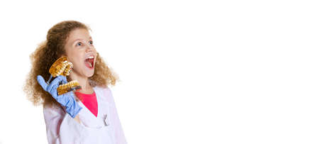 Flyer with excited little girl, child in image of dentist doctor wearing white lab coat and gloves...