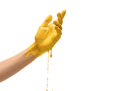One painted human hand gesturing isolated on white studio background. Concept of human relation,...