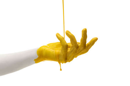 One painted human hand gesturing isolated on white studio background. Concept of human relation, symbolism, culture and historyの写真素材