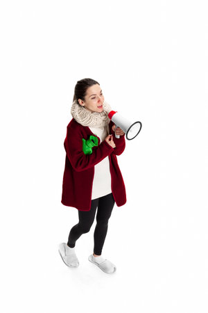 Portrait of young ill girl feeling sick, has running nose isolated over white studio background. Flu, cold, allergyの写真素材