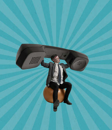 Businessman doing exercise with big retro handset, phone. Contemporary art collage. Inspiration, idea, trendy urban magazine style. Surrealism.の写真素材