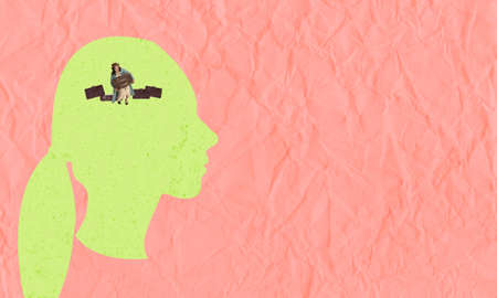Contemporary artcollage. Tired young woman inside of giant drawn head on pink paper background....