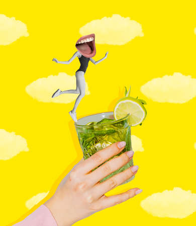 Young slim girl jumping in mojito cocktail glass isolated on yellow background. Conceptual, contemporary bright art collage. Surrealismの写真素材
