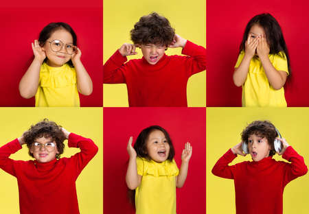 Collage made of portraits of two little kids, boy and girl isolated on red and yellow studio background. Education, human emotions, facial expression concept.の写真素材