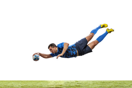 One man, rugby player catching ball in jump isolated on white background. Jump and action concept. an incredible strain of all forcesの写真素材
