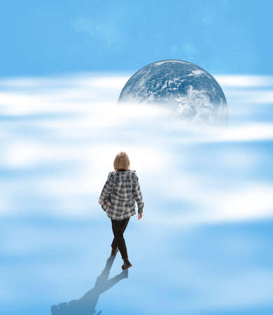 Conceptual creative artwork with young girl walking on clouds. Concept of astronautics, dreams,...