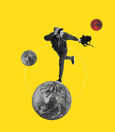 Young man, student with backpack running away from one planet to another. Contemporary art collage. International immigrationの写真素材