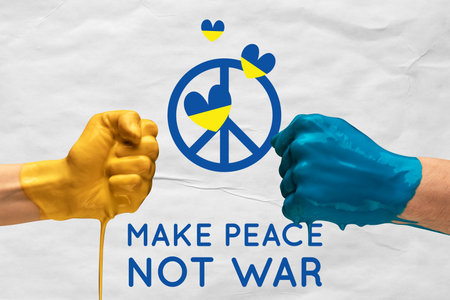 Contemporary art collage. two hands, fists covered with blue and yellow flag colors symbolizing peaceの写真素材