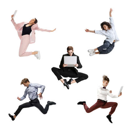 Emotional office workers jumping and dancing in casual clothes and business suit with folders, coffee, tablet on white. Ballet dancers. Creative collage.の写真素材