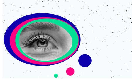 Creative design. Beautiful female eye in multicolored circles isolated over white backgroundの写真素材