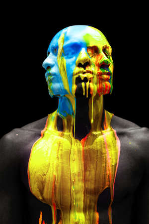 Contemporary artwork. Young bald man, bare-chested model covered with multicolored paints isolated...