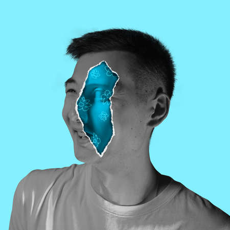 Contemporary artwork with portrait of happy man with effect of torn skin and insertion of part of face of plaster statue. Surrealism, torn personality conceptの写真素材