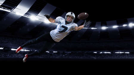 Collage with sportive american football player in action, catching the ball against night stadium with spotlights background. Sport, championship conceptの写真素材