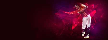 Artwork, poster or flyer. One professional baseball player in motion and action with bat isolated on dark background with polygonal and fluid neoned elementsの写真素材