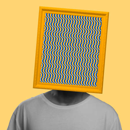 Contemporary art collage. Man with yellow frame head and hypnotic design isolated over yellow...