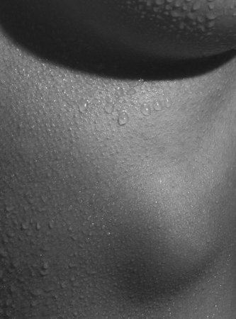 Detailed texture of human female skin. Close up part of womans body. Skincare, bodycare, healthcare, hygiene and medicine concept. Macro photographyの写真素材