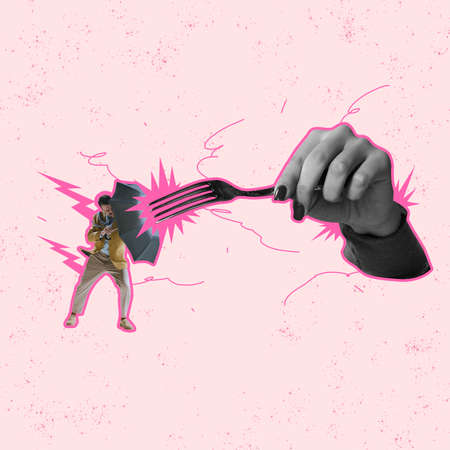 Contemporary art collage. Man fighting against fork with umbrella isolated over light pink backgroundの写真素材